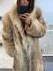 Midi length fur coat